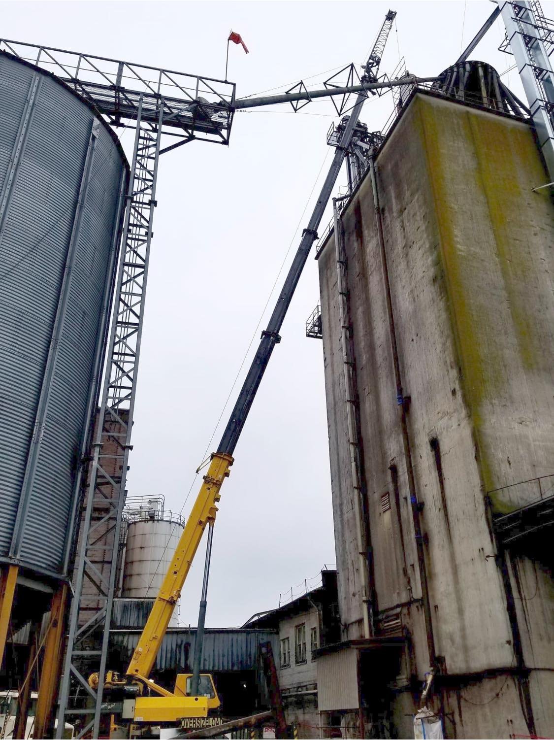 Mobile crane service on a commercial job site